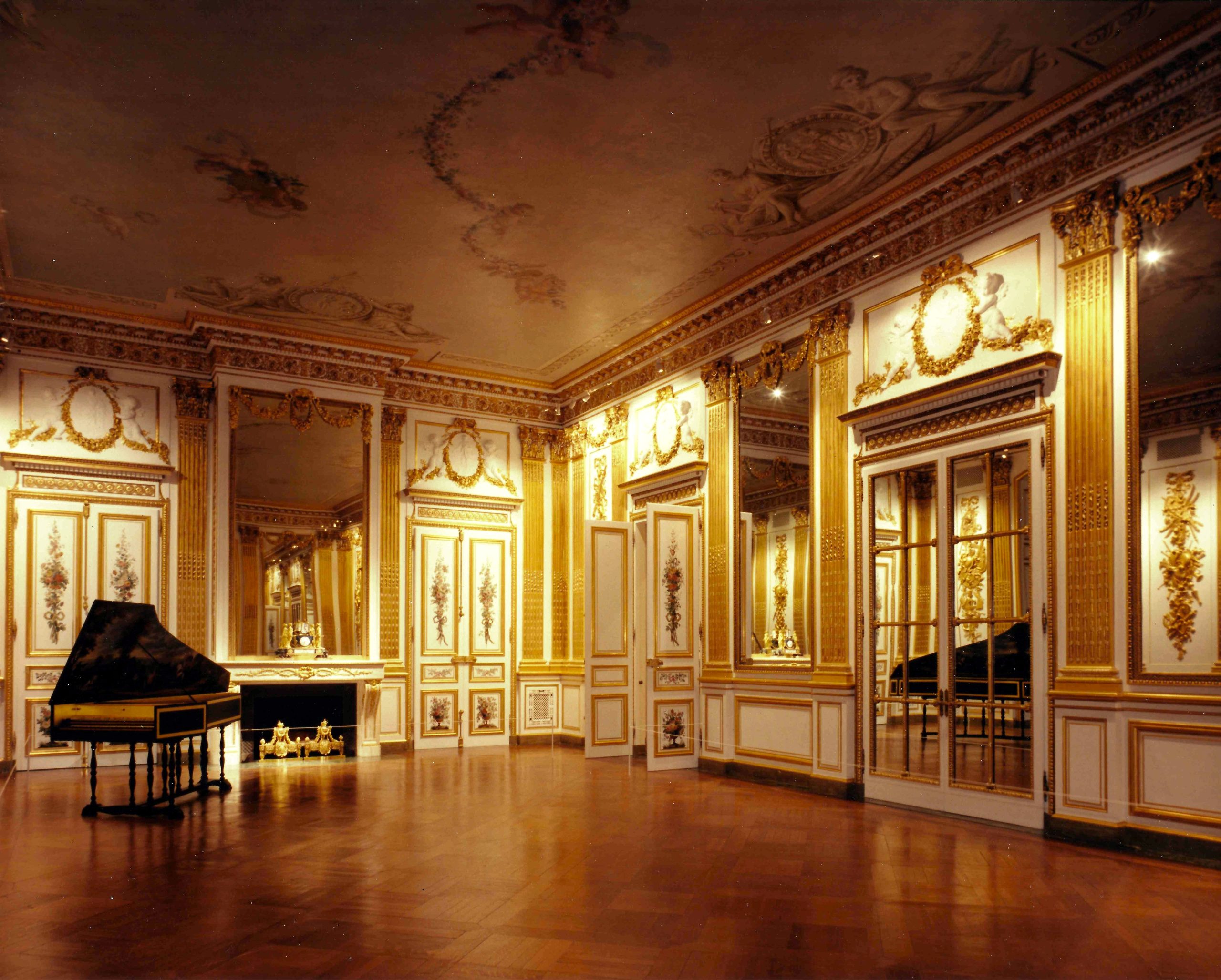 W.A. Clark brought over form Paris this golden room, the Salon Doré.